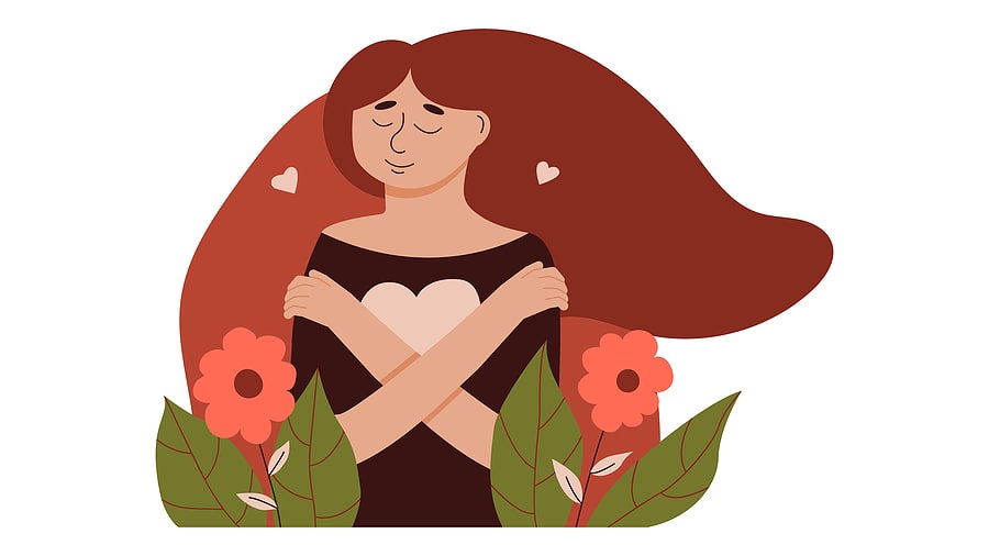woman holding herself giving her love