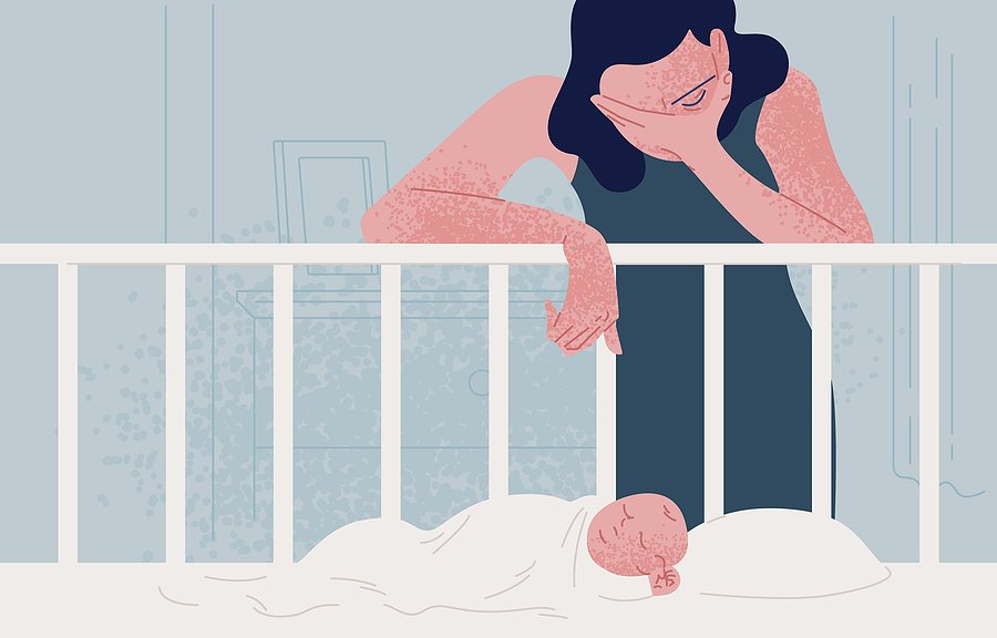 Sad tired woman leaning over newborn baby sleeping in crib