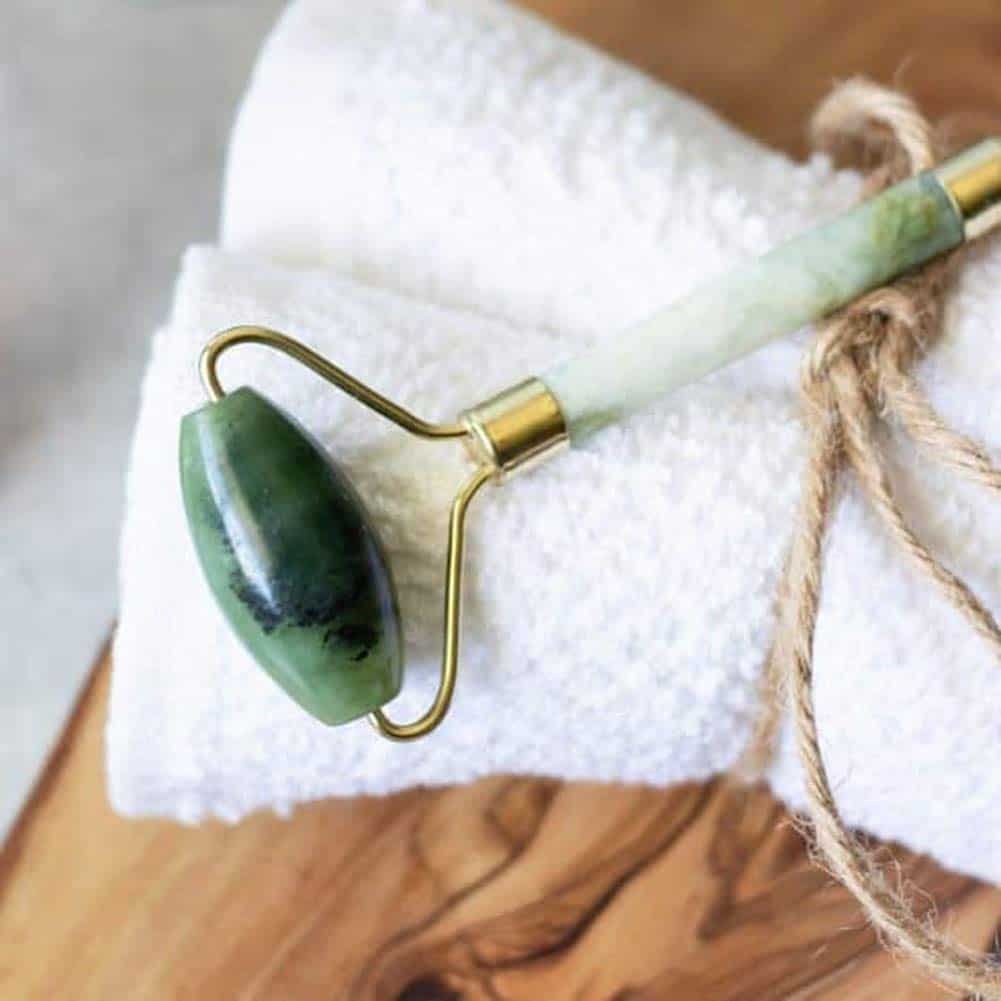 jade roller on a towel