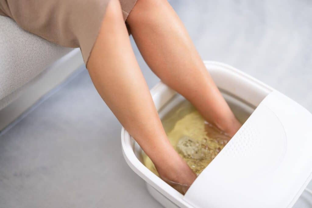 Woman enjoy footbath at home