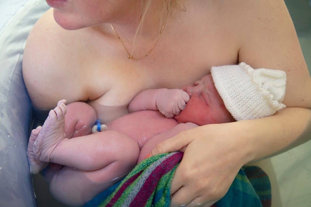 Mom holding newborn baby