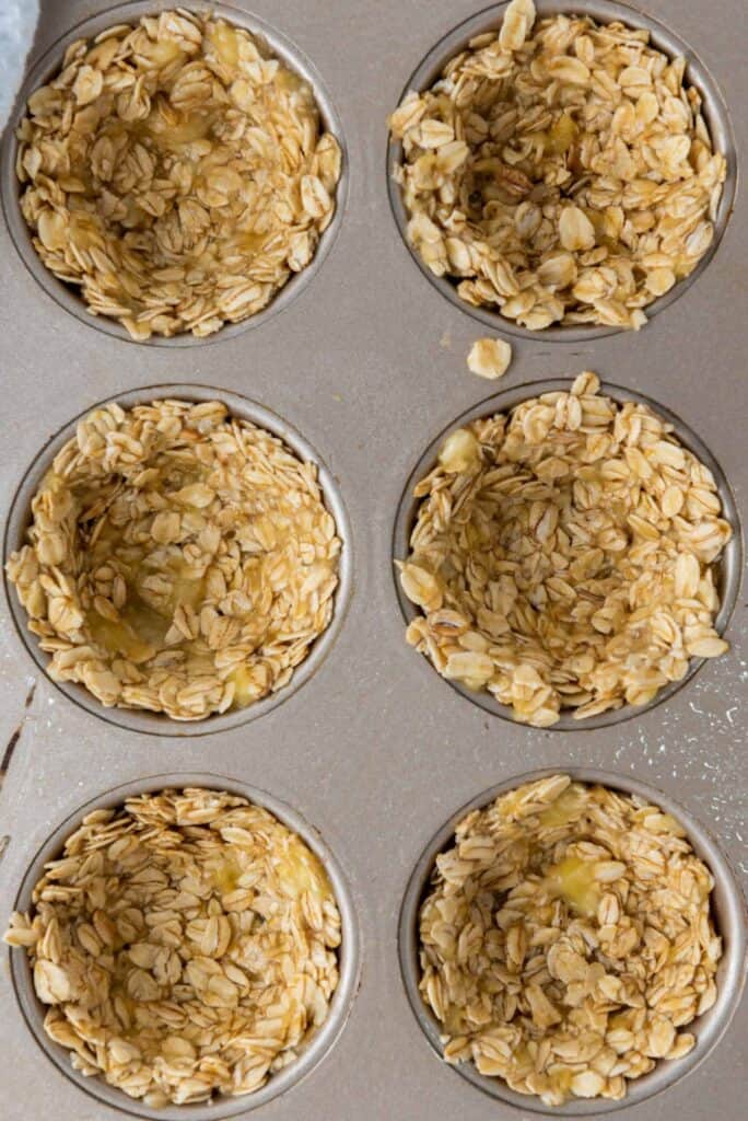 mixture of Granola Berry Cups in a muffin tray