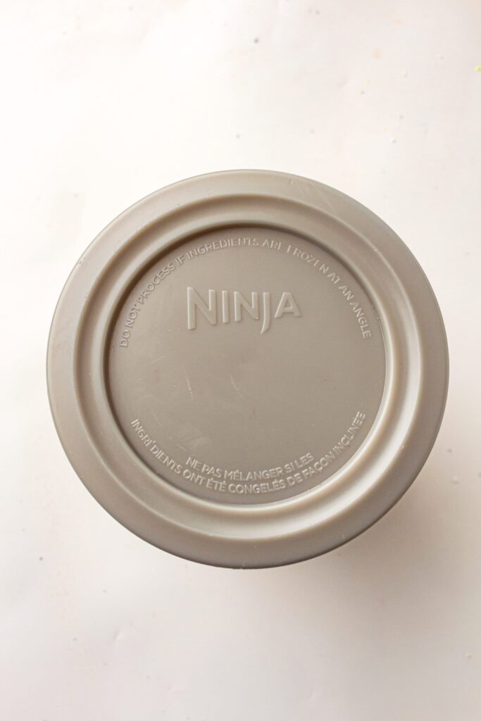 Securing the lid tightly on the container before placing it in the fridge.