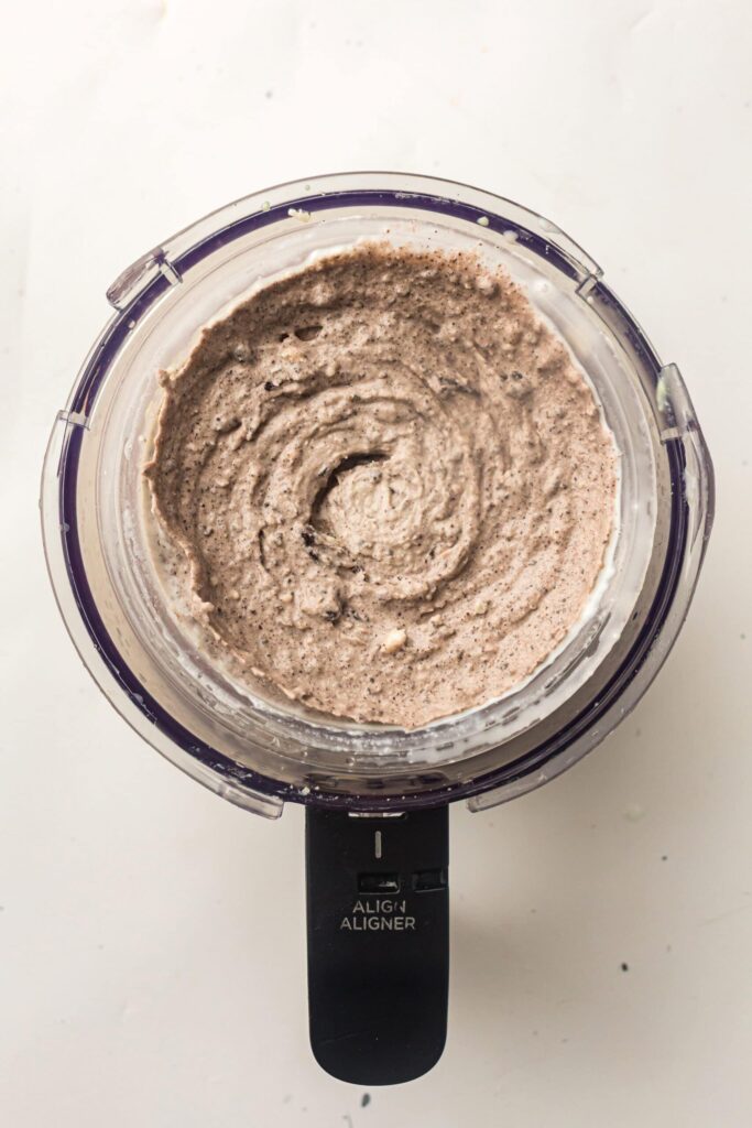 Mixing everything together until smooth and creamy.